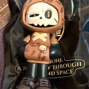 Mr. Bone Time Series Action Figure. A journey through time “ Stone Age.